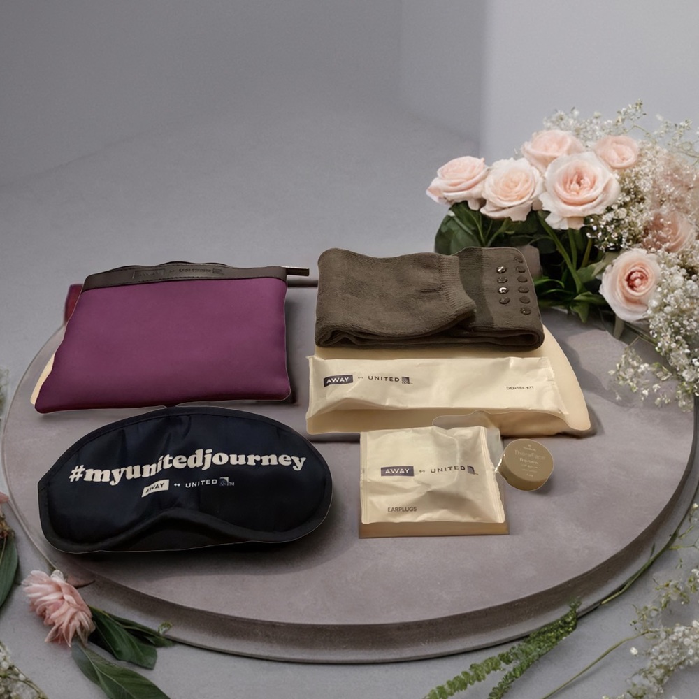 Travel pouch with travel essentials 7 piece kit. Unisex